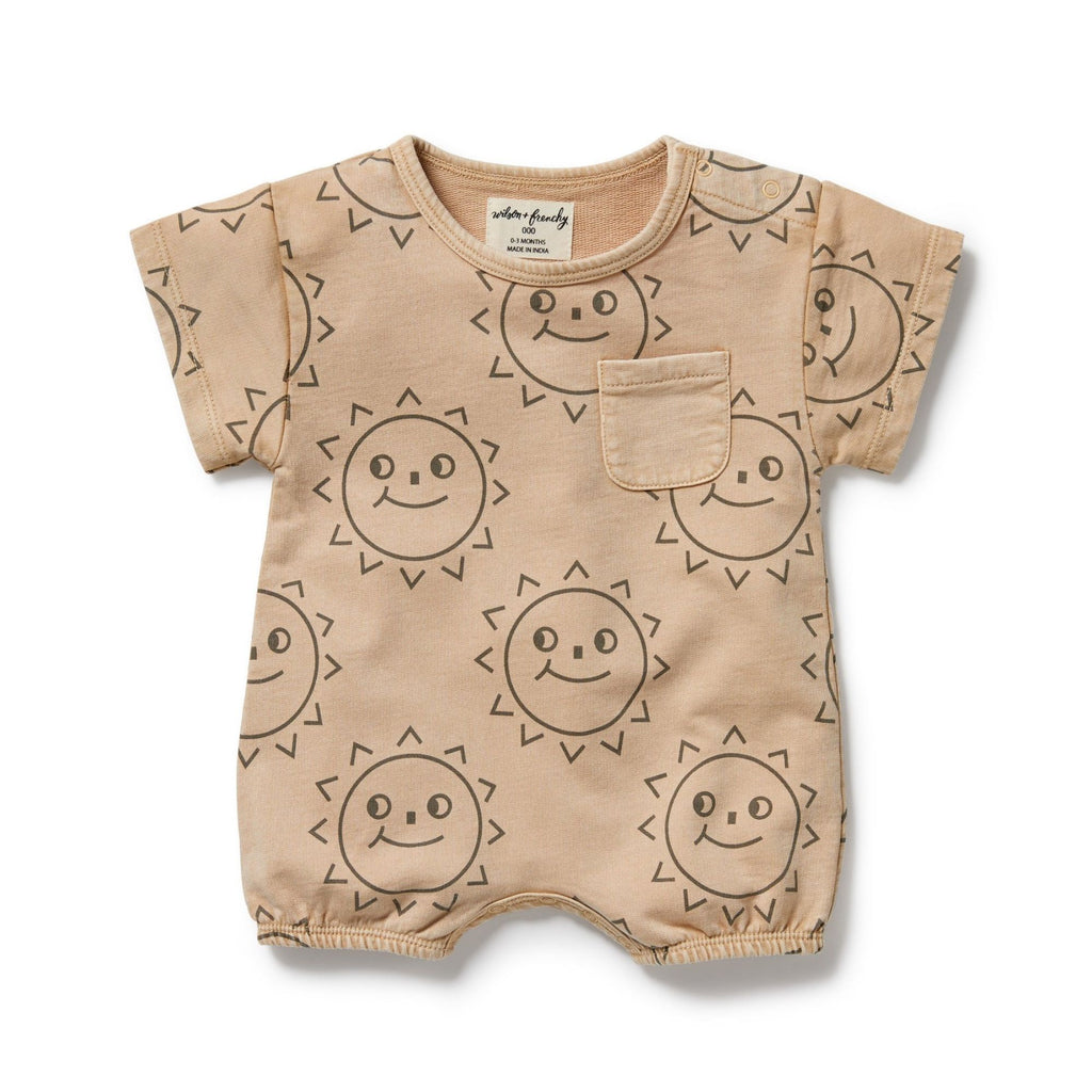 Beige baby romper with sun pattern on a white background