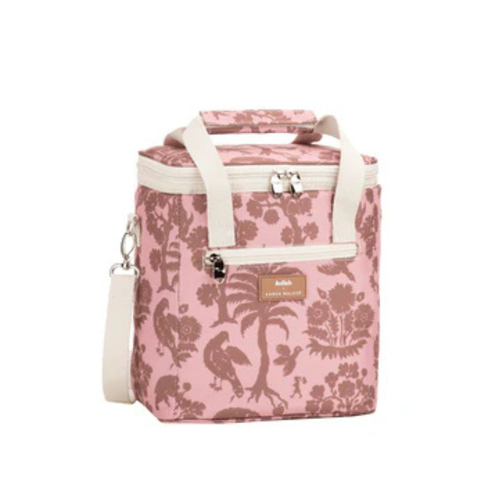 Pink floral-patterned cooler bag with a white strap on a white background