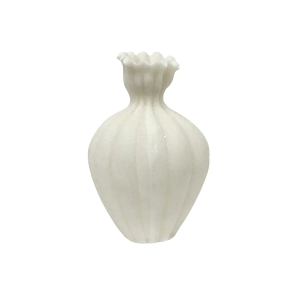 White ceramic vase with a textured surface on a white background
