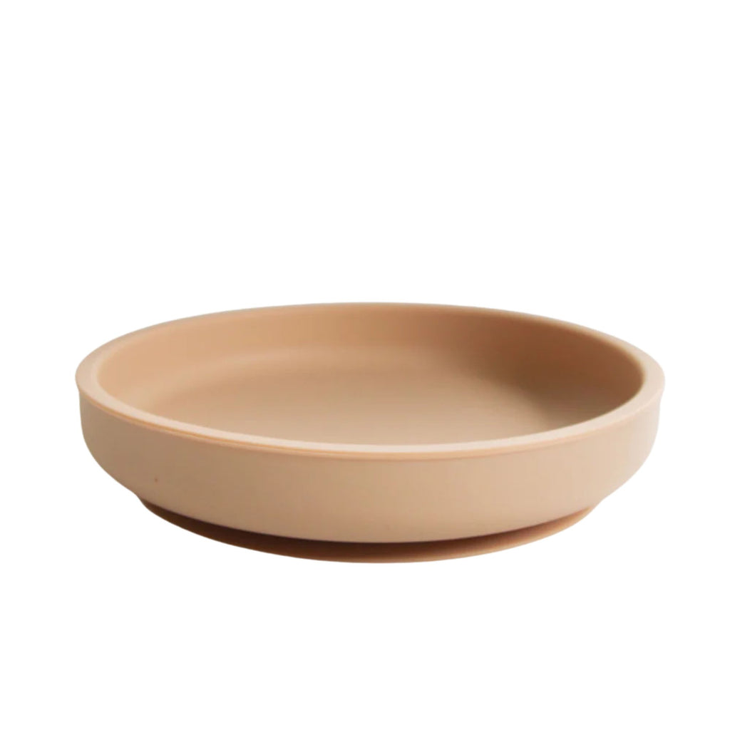 Beige ceramic bowl on a white background