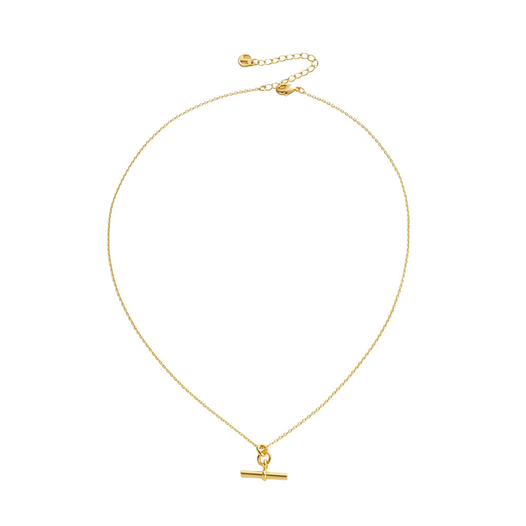 Gold necklace with a small pendant on a white background
