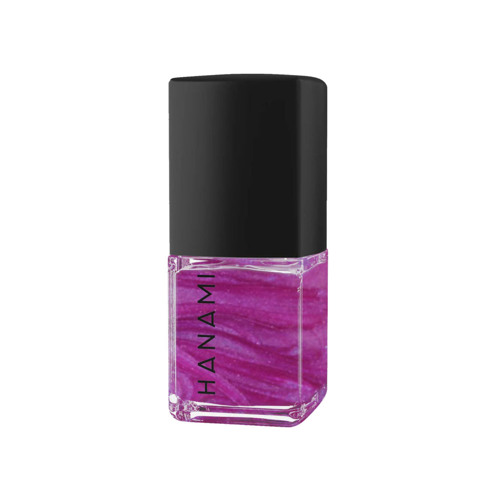 Pink nail polish bottle with black cap on a white background