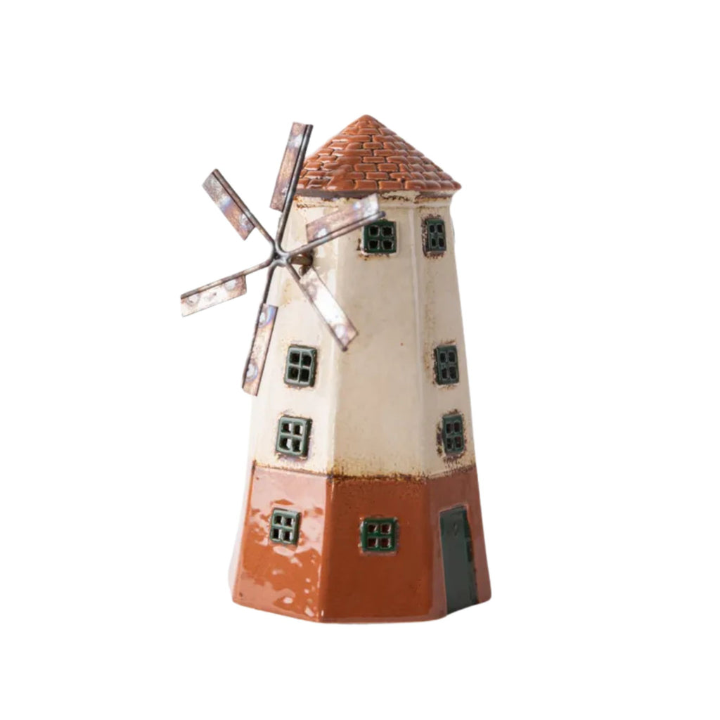 Decorative model of a windmill on a white background