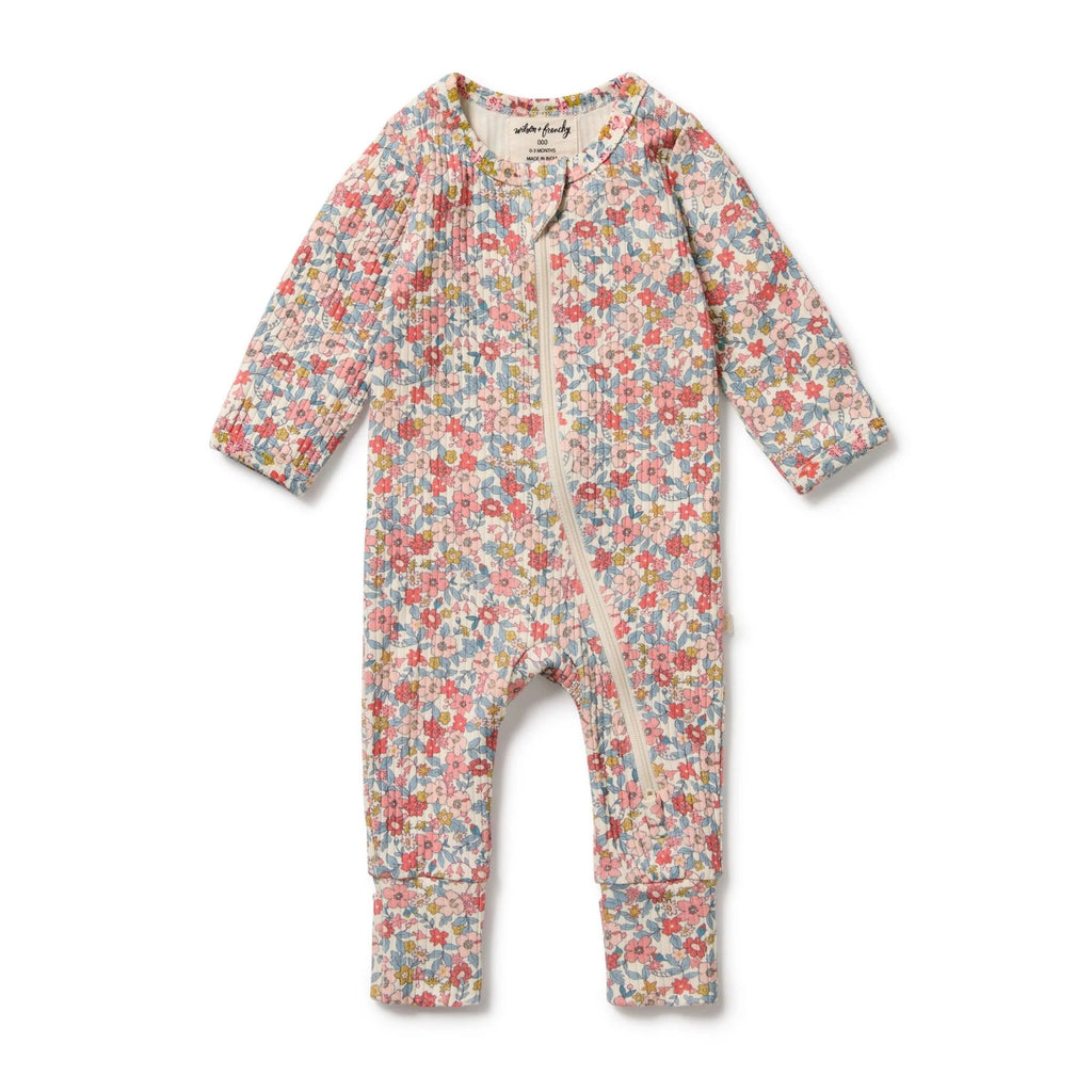 Floral baby onesie on a white background
