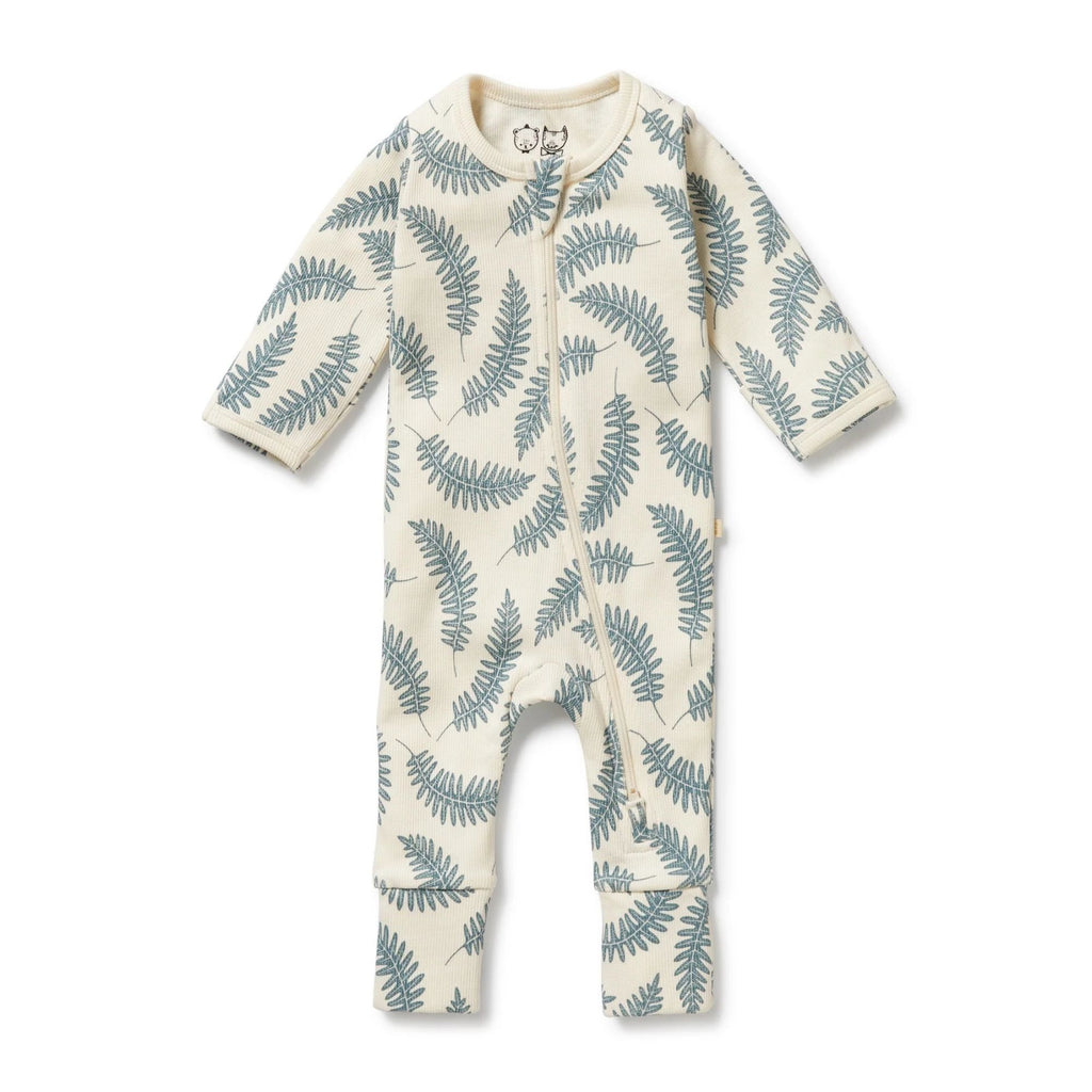 Baby onesie with fern leaf pattern on a white background