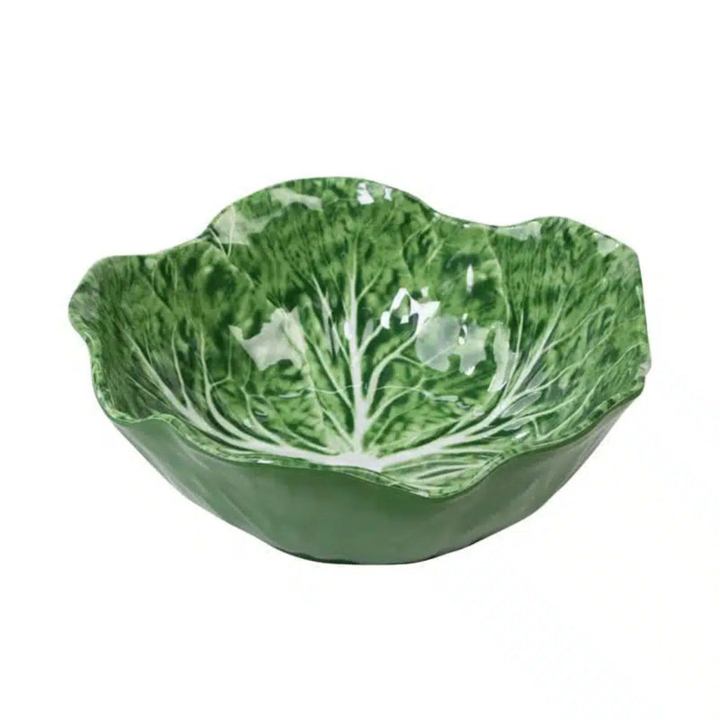 Green ceramic bowl designed to resemble a cabbage leaf on a white background