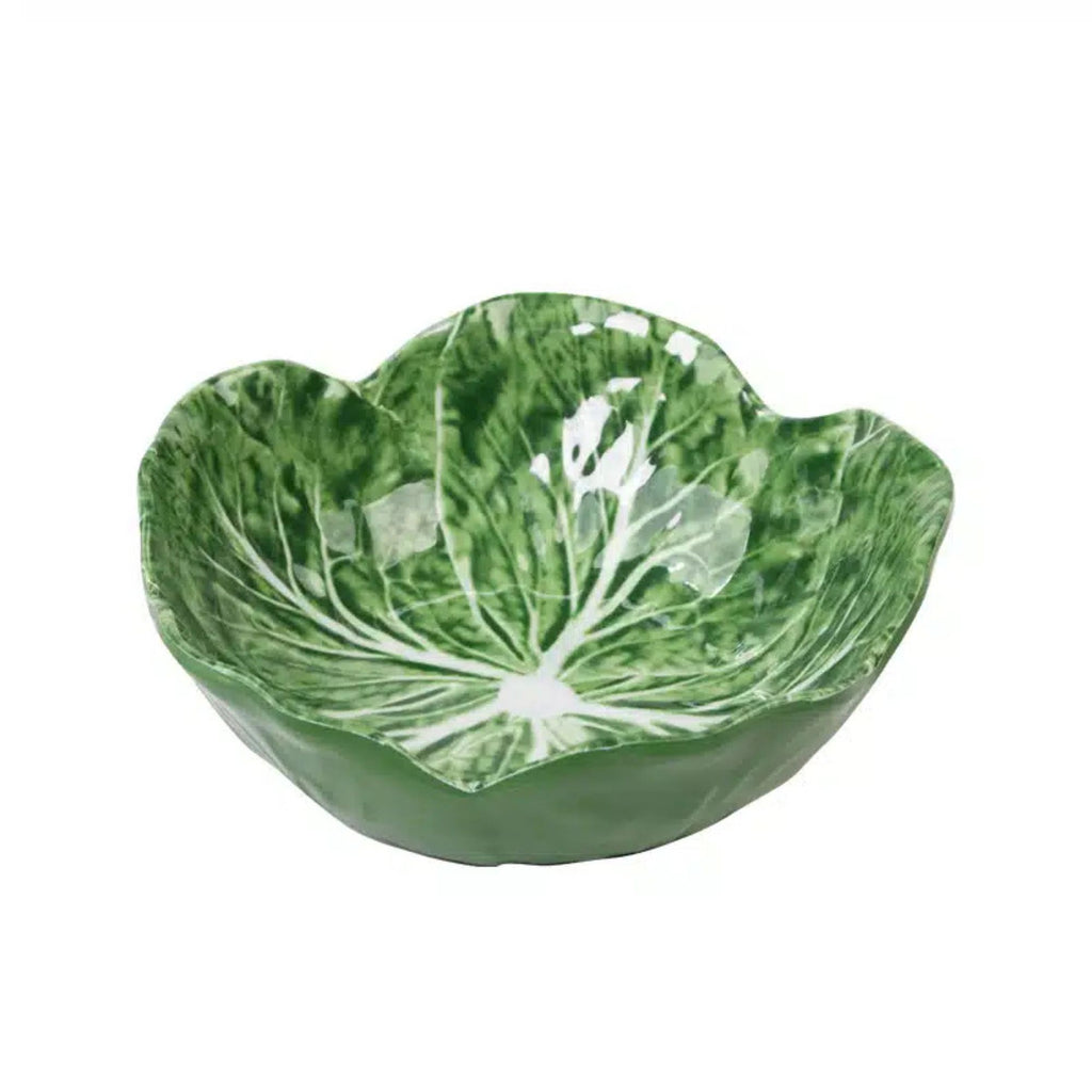 Green leaf-shaped bowl on a white background