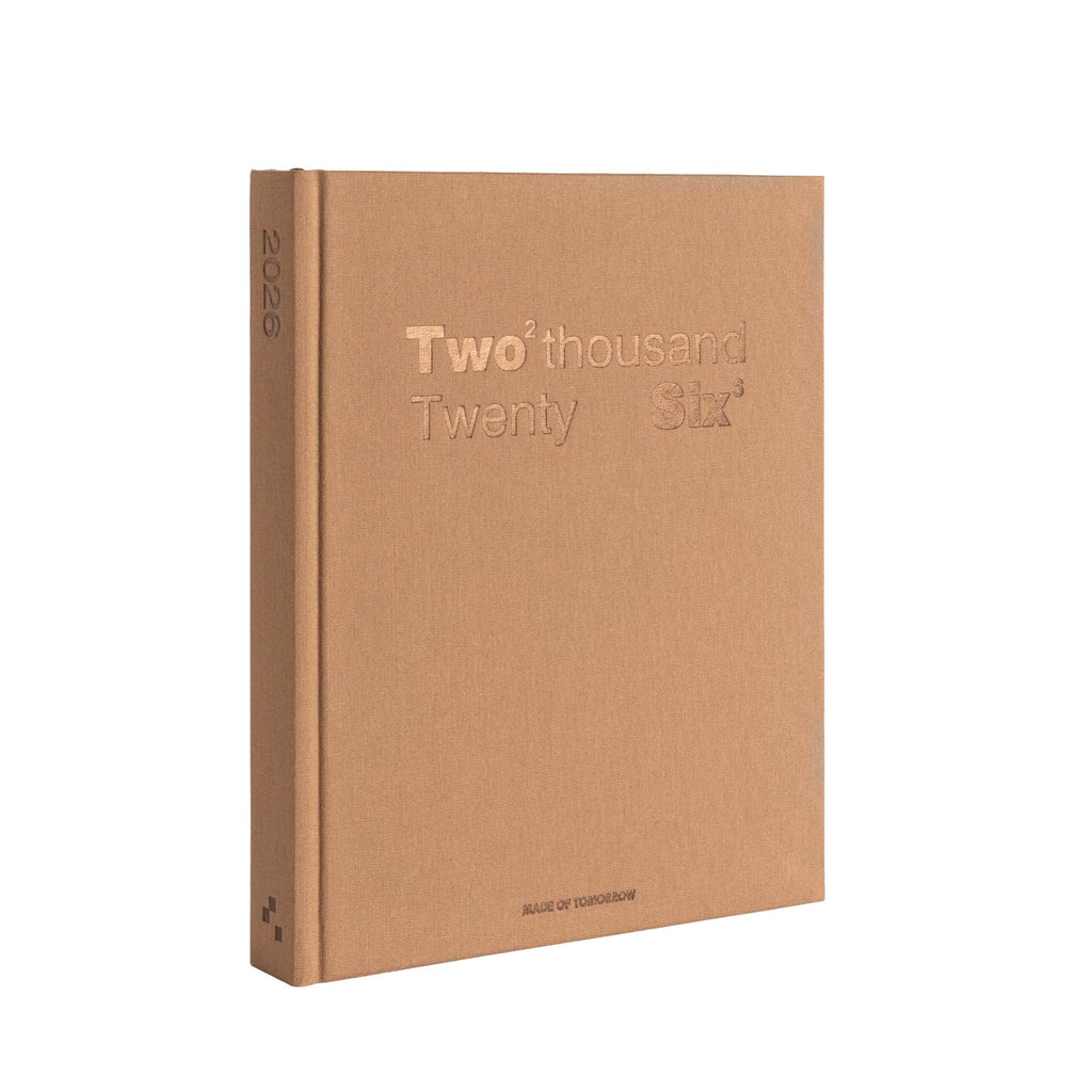 Brown notebook with 'Two thousand Twenty Six' embossed on the cover