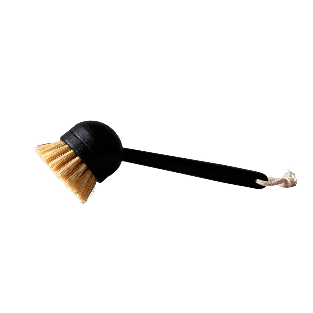 Black brush with bristle head on a white background