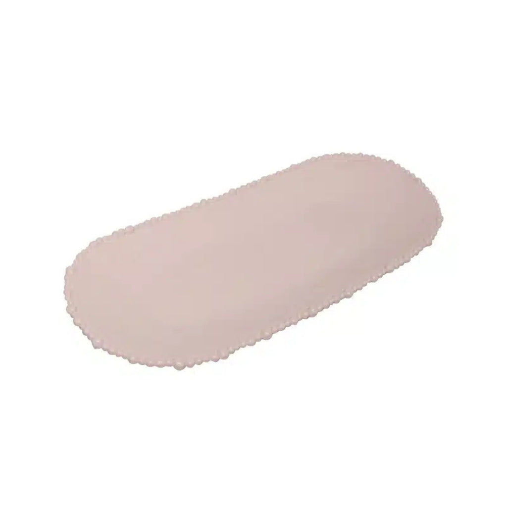 Pink oval platter on a white background