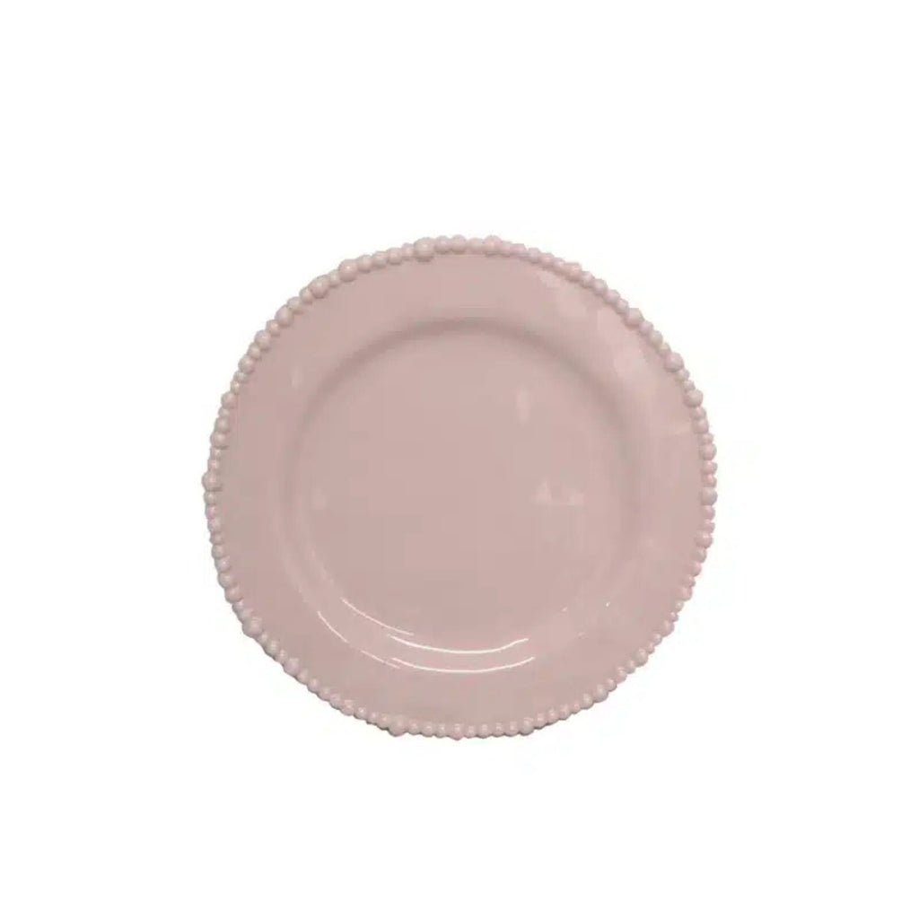 Pink melamine plate with decorative edge on a white background