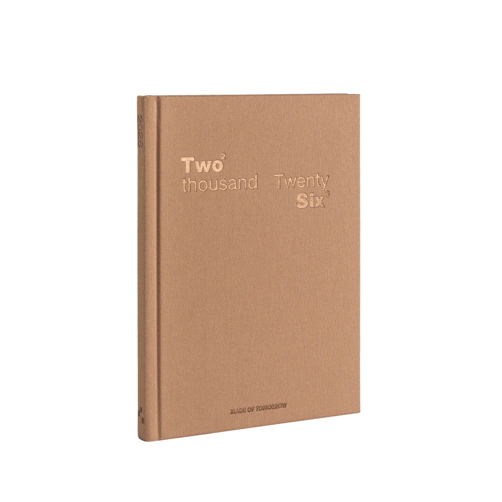 Brown diary with 'Two thousand Twenty Six' text on a white background