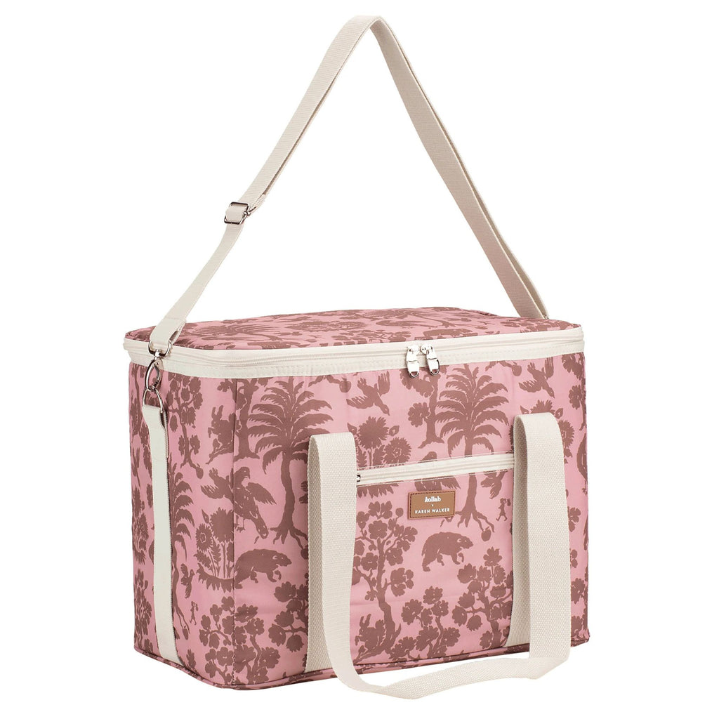 Pink floral-patterned cooler bag with white handles and strap on a white background