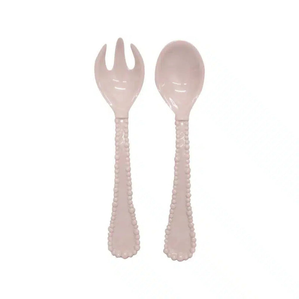 Set of pink melamine salad server on a white background