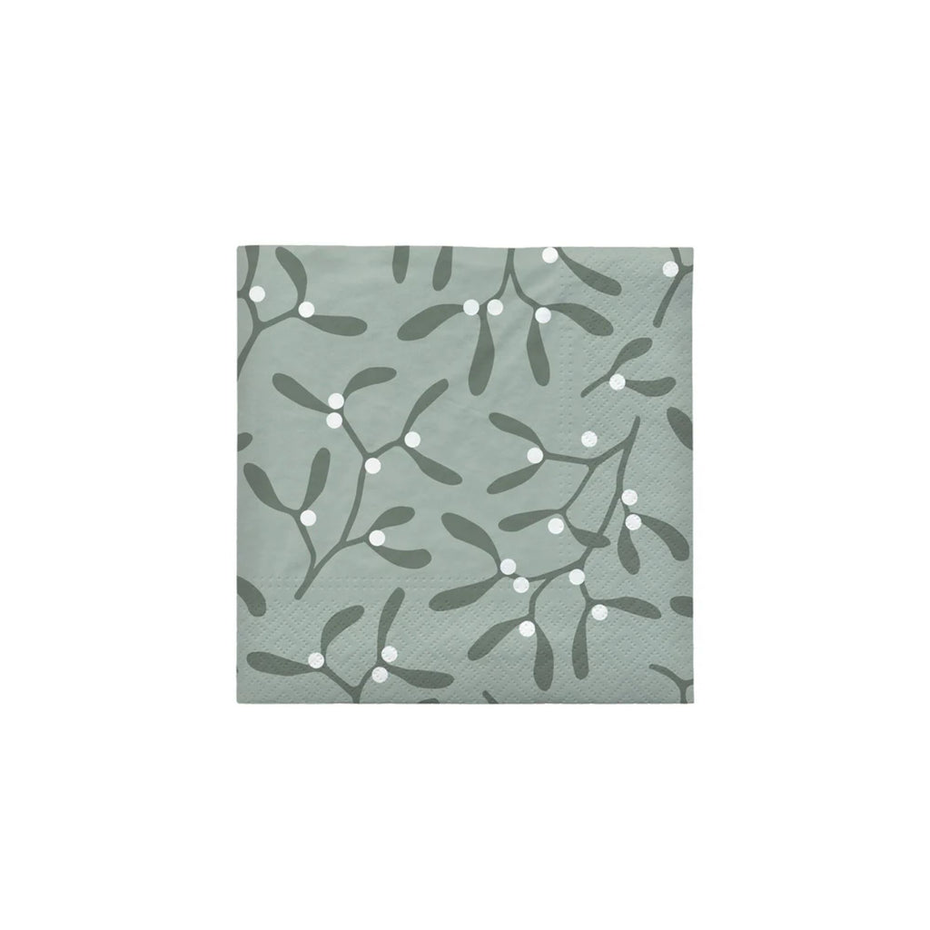 Patterned paper with green leaves and white berries on a light blue background