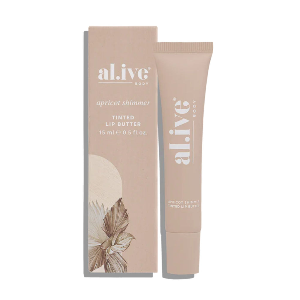 Tinted lip butter with packaging on a white background