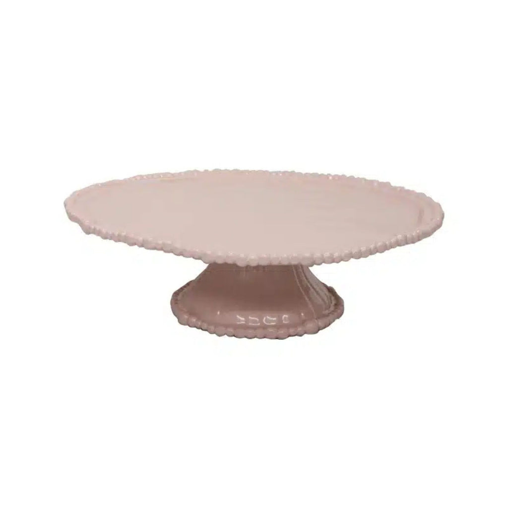 Pink ceramic cake stand on a white background