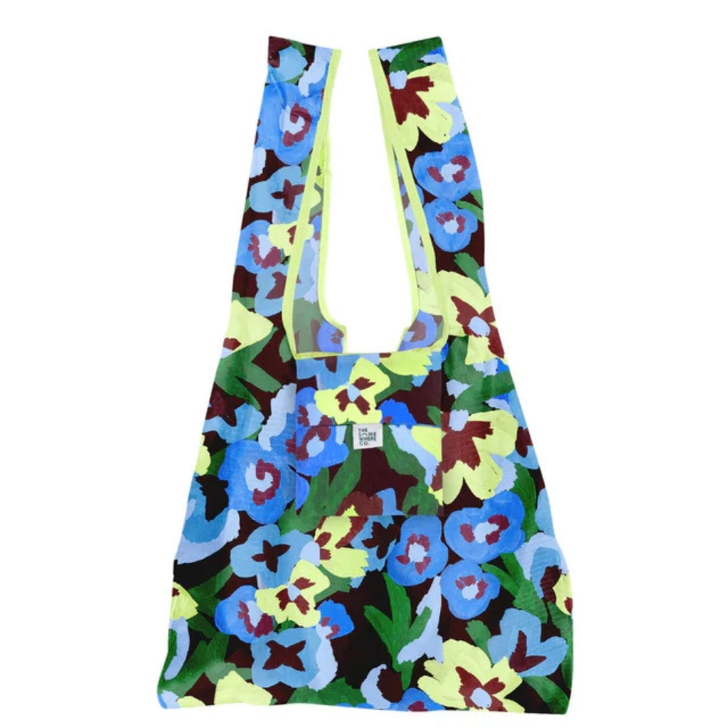 Floral patterned bag with colorful design on a white background