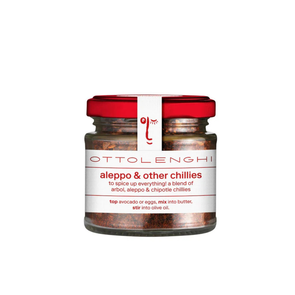 Ottolenghi Aleppo & Other Chillies. Clear jar with red lid and white label