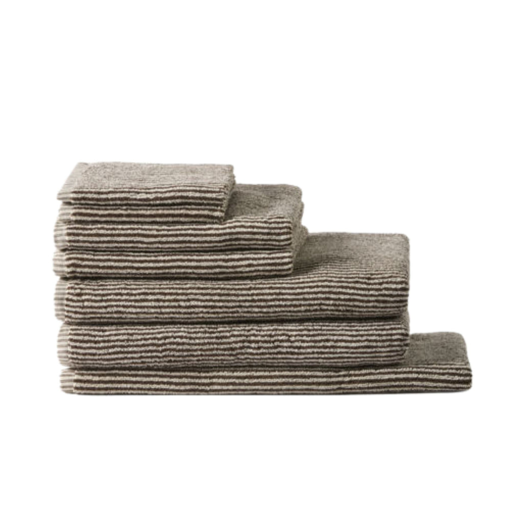 Stack of gray towels on a white background