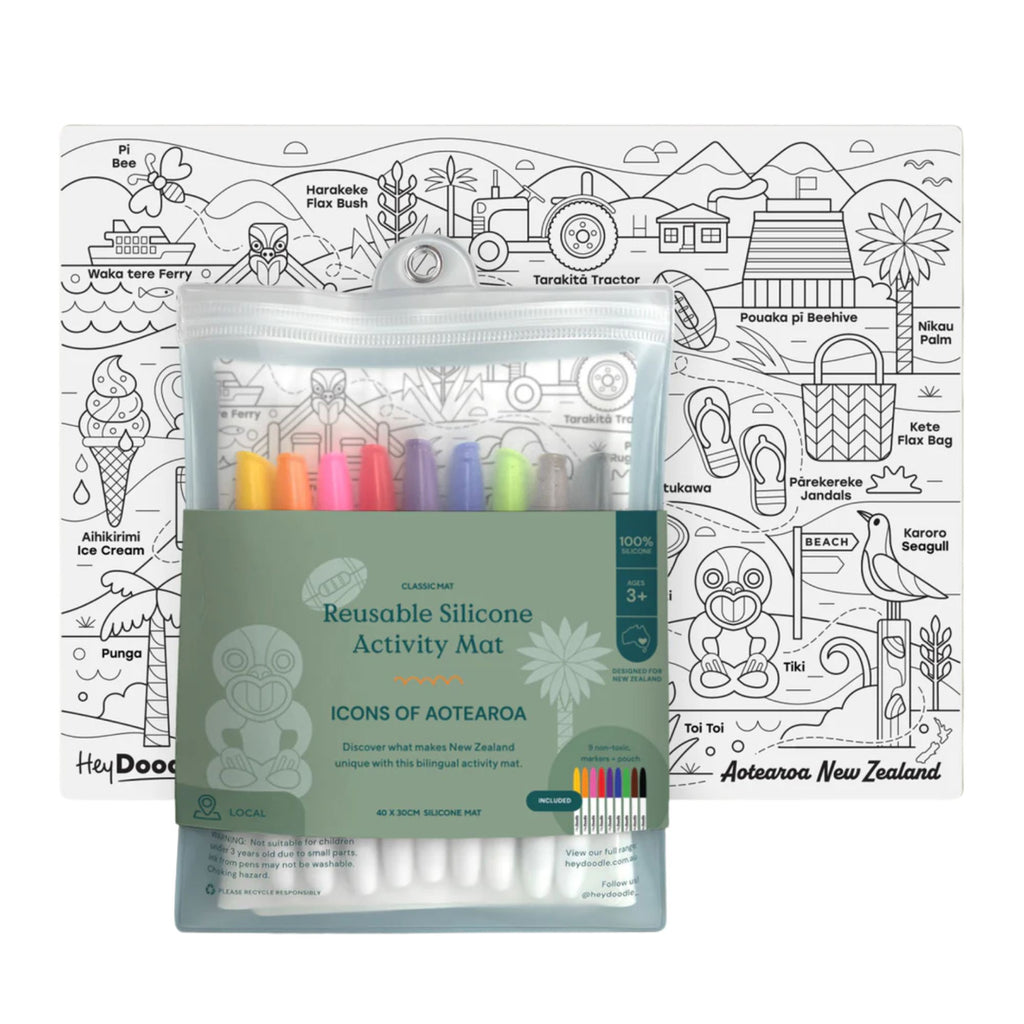 Reusable silicone activity mat with coloring book and markers on a white background