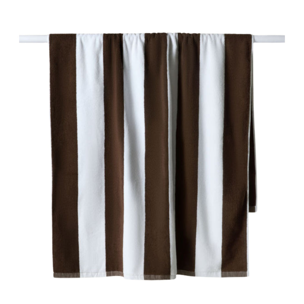 Striped brown and white curtain on a white background