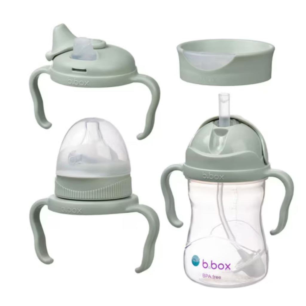 Set of baby bottles and sippy cups with obox branding on a white background