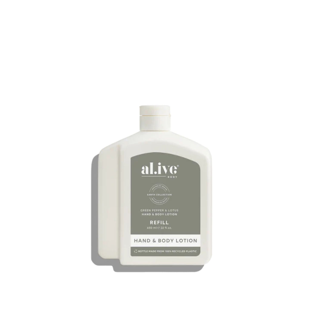 White bottle of al.ive hand and body lotion refill on a white background