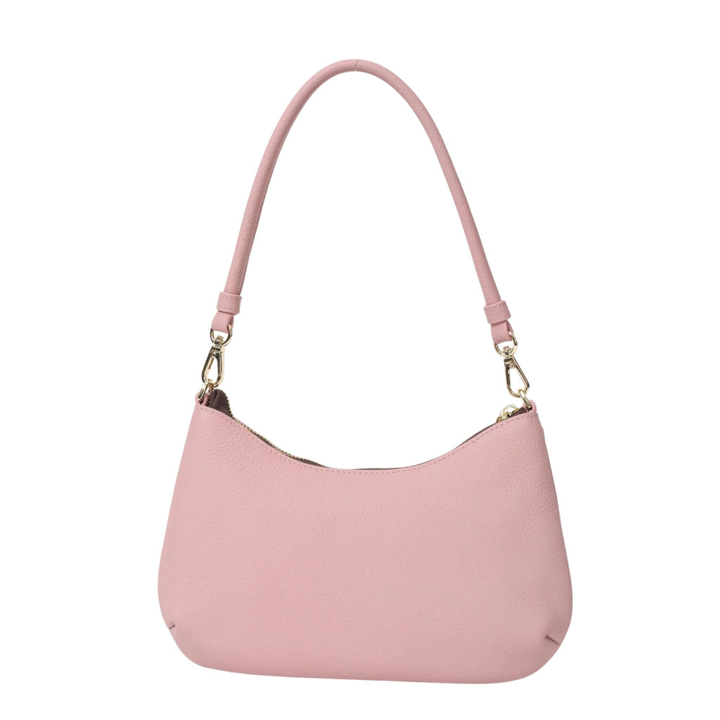 Pink handbag with a strap on a white background