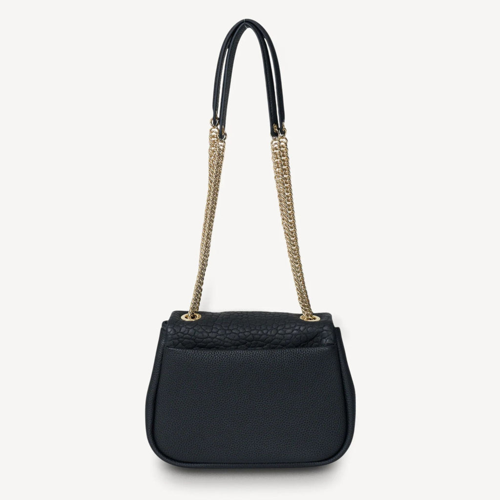 Black handbag with gold chain strap on a white background