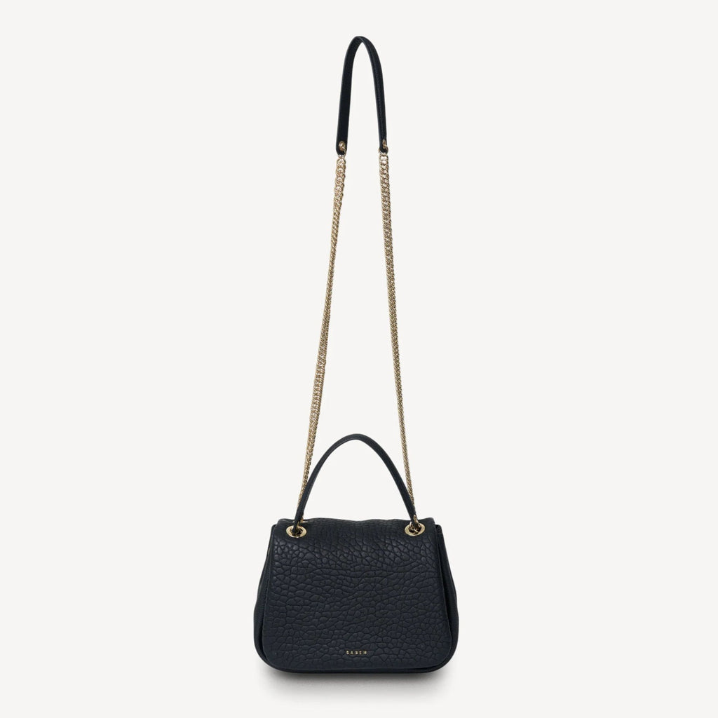 Black handbag with a chain strap on a white background