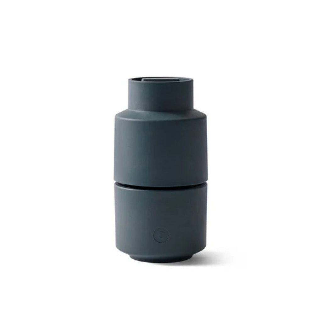 Dark gray cylindrical container on a white background