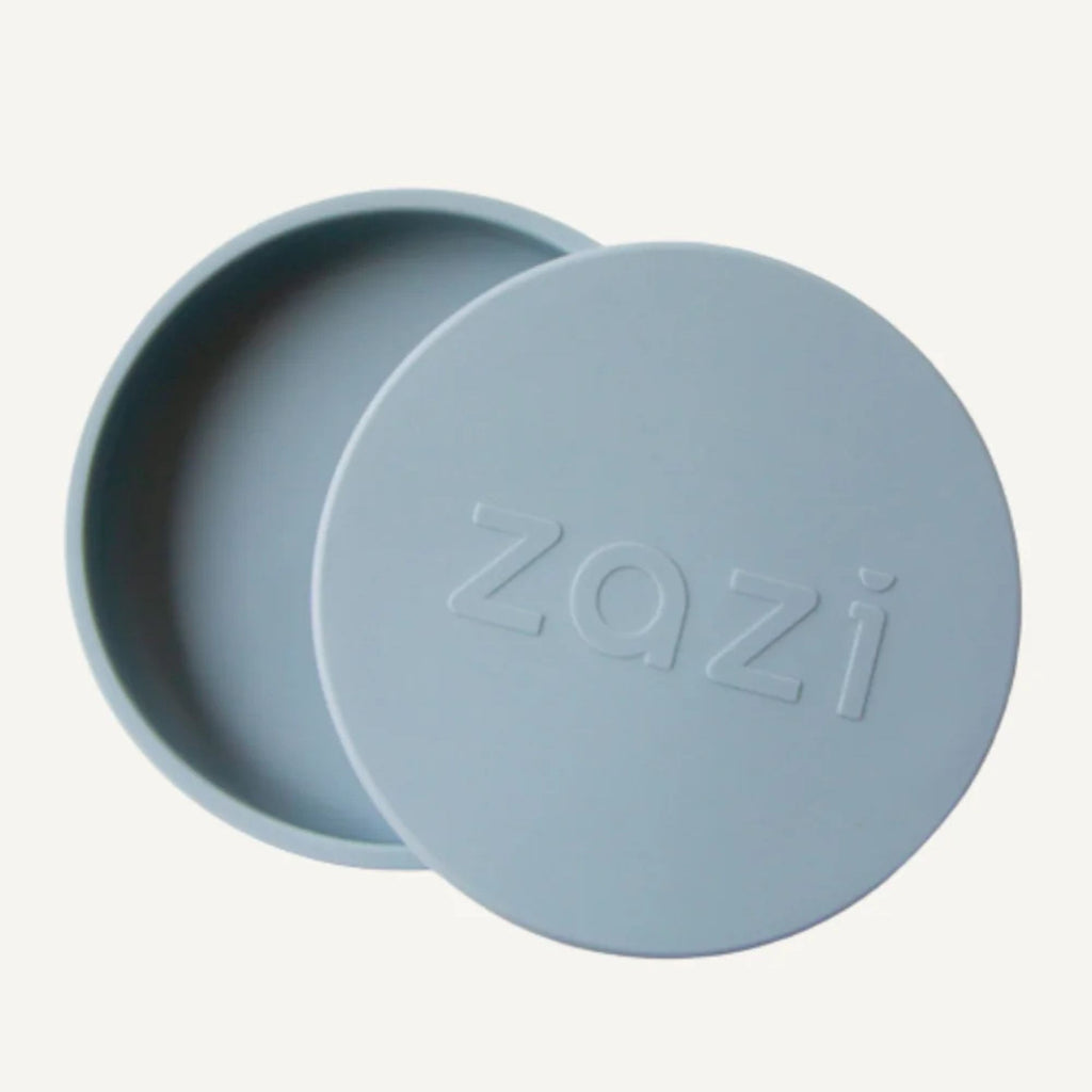Light blue silicone lid with 'Zazi' branding on a white background