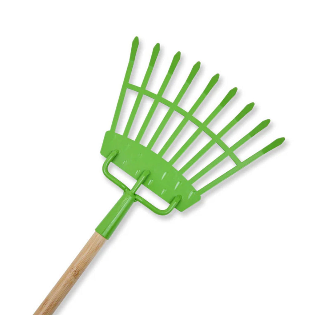 Green garden rake with wooden handle on a white background