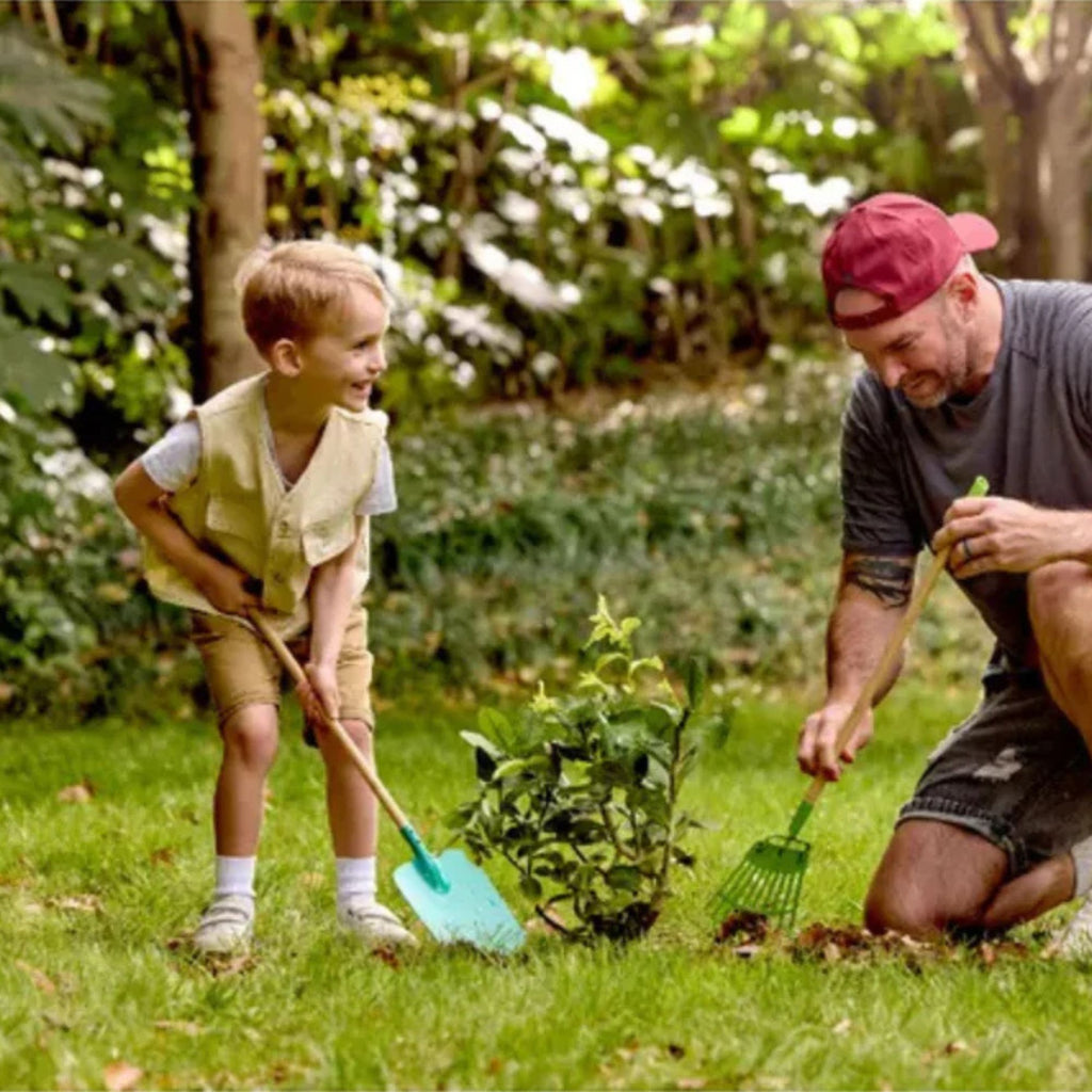 Man and child gardening together in a garden setting