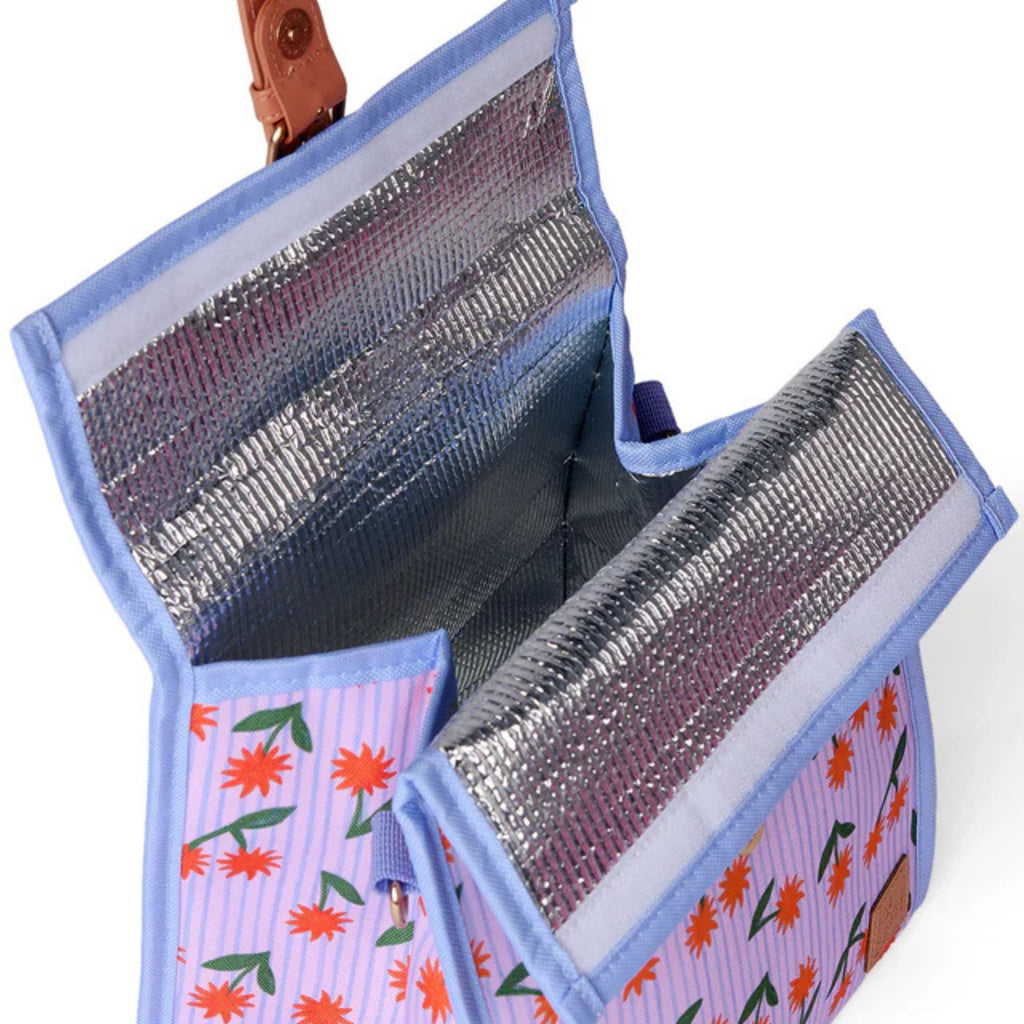 Insulated lunch bag with floral pattern on a white background