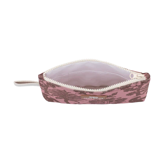 Small pink pouch with floral pattern on a white background