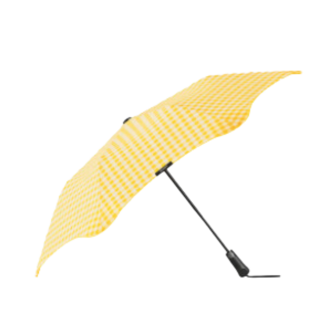 A yellow and white checkered pattern blunt brand with a black handle
