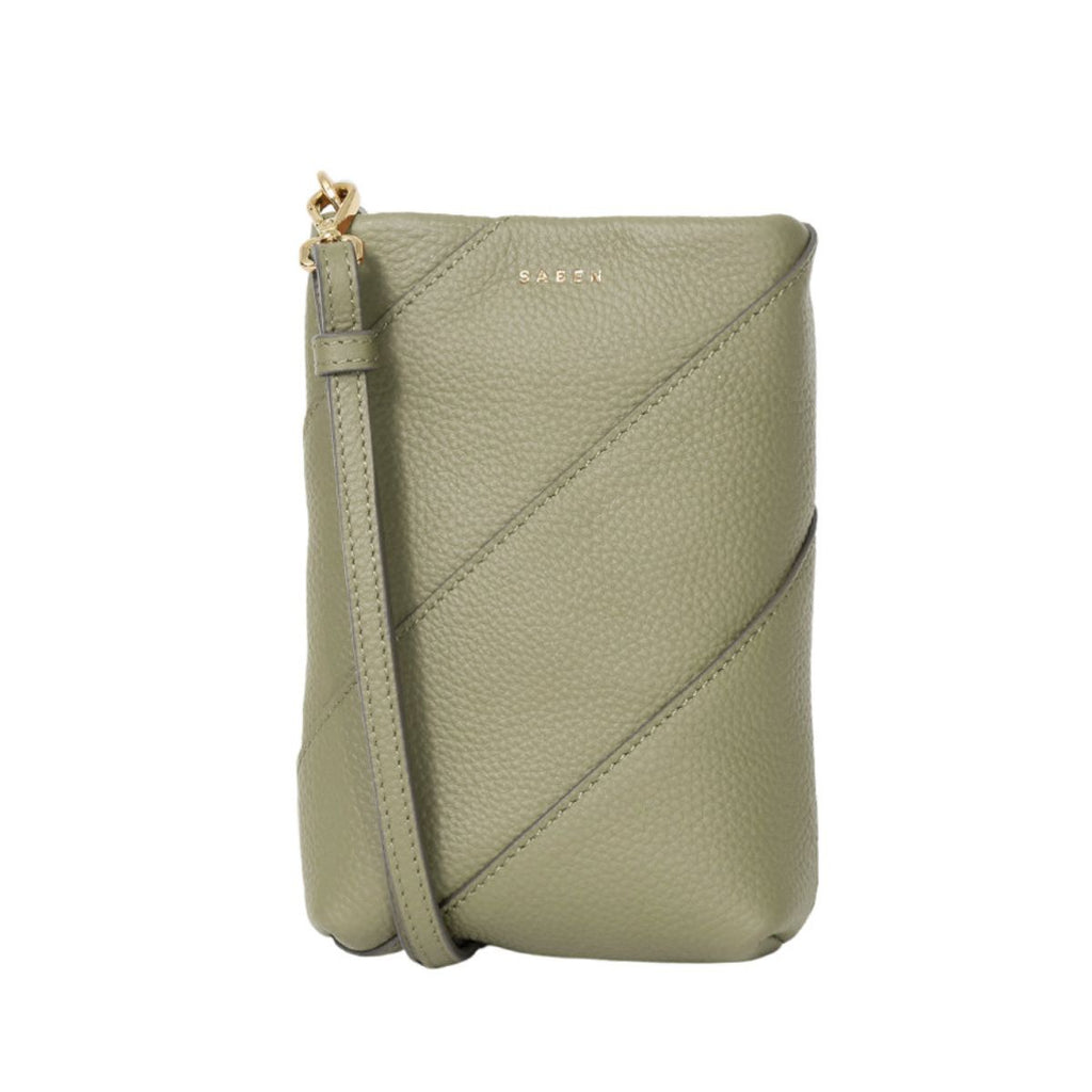 Green leather crossbody bag on a white background