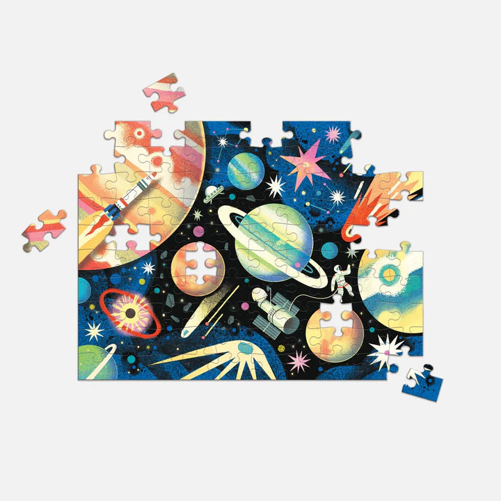 Space-themed puzzle with various celestial bodies and astronauts on a white background