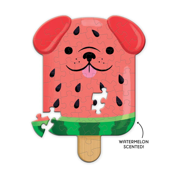 Watermelon-shaped popsicle puzzle with a missing piece on a white background