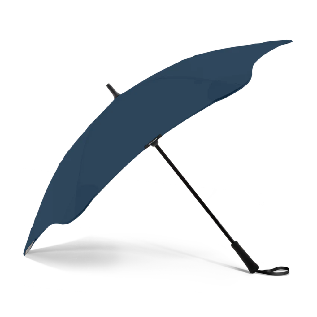 A navy and black handle blunt brand umbrella