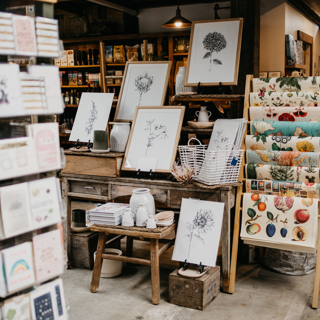 A decorative display of frames in a giftshop