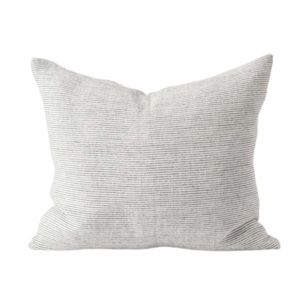 A white and grey fine line patterned couch cushion