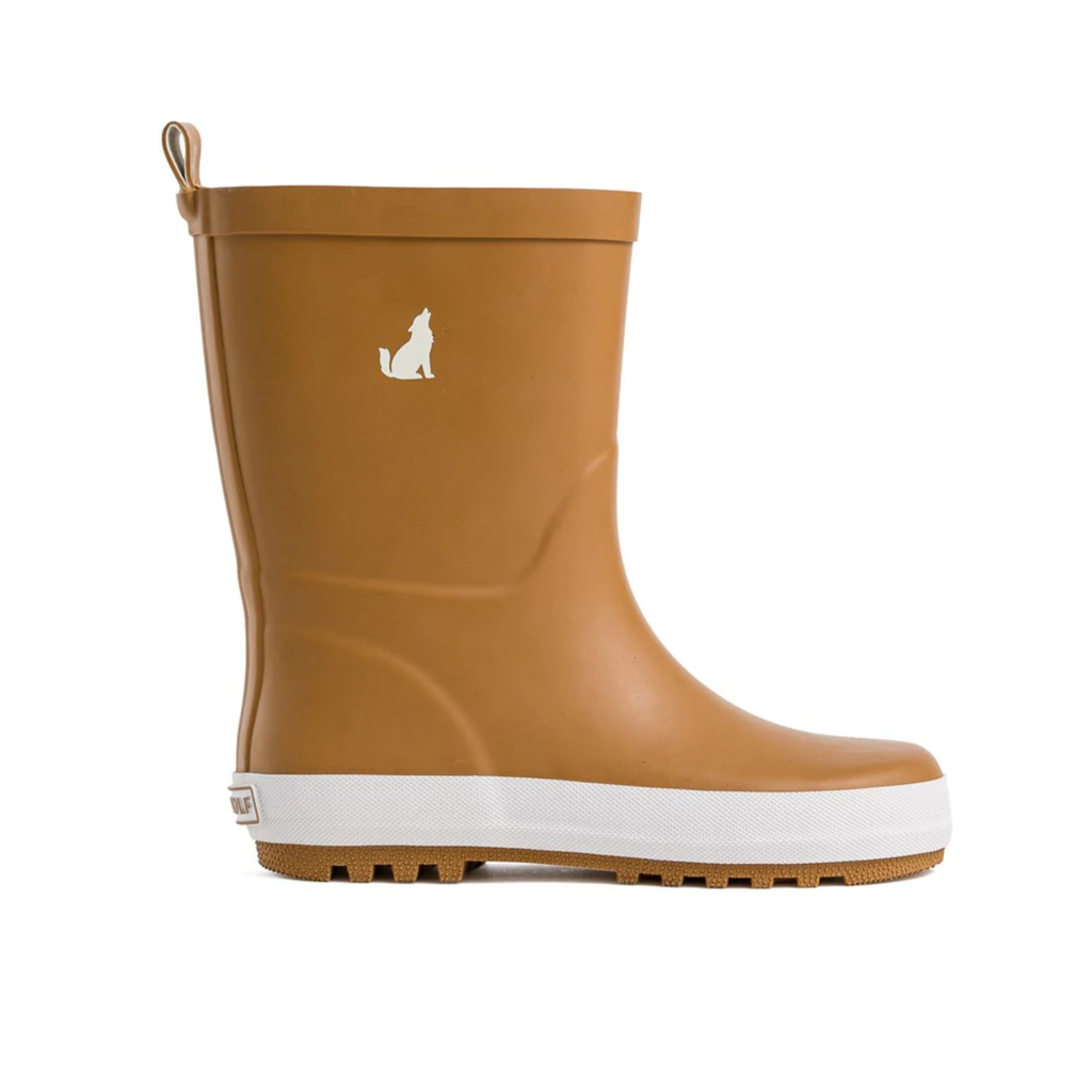 Tan children's gumboots with a white rim and a white wolf detail