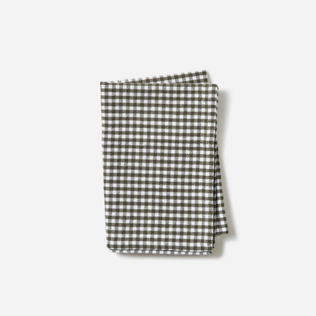 A green gingham folded tea towel