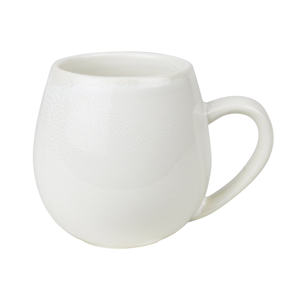 A rounded shape white mug with a handle on a white background